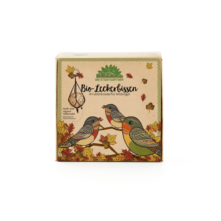 Verpackung von "Bio-Leckerbissen" Vogelfutter von Die Stadtgärtner mit illustrierten Wildvögeln und Herbstblättern.