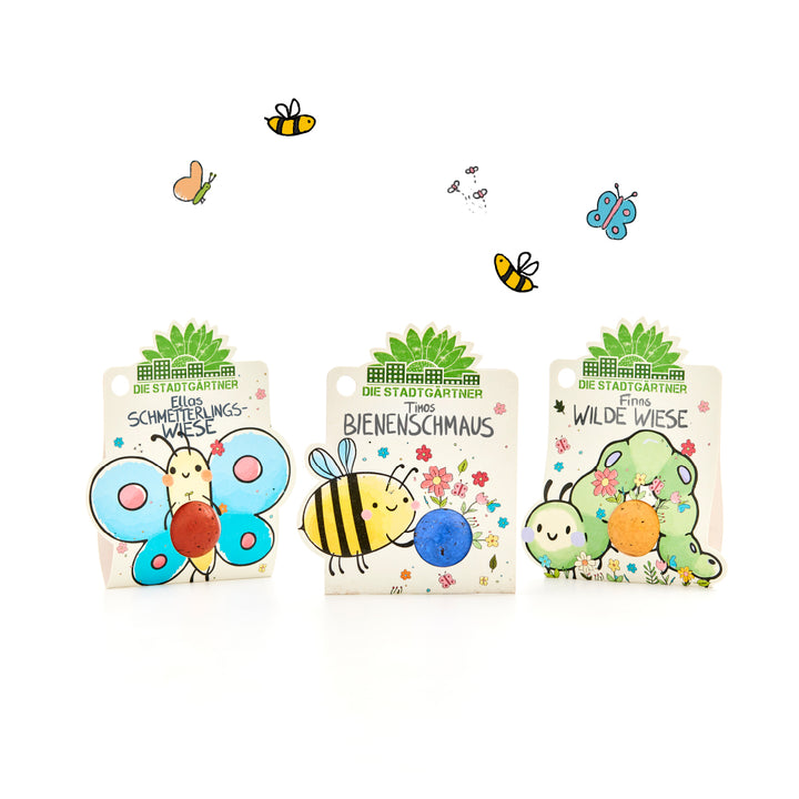 Drei bunte Samenpakete von "Die Stadtgärtner" mit Illustrationen von Schmetterling, Biene und Raupe, dekoriert mit Blumen und kleinen Insekten.