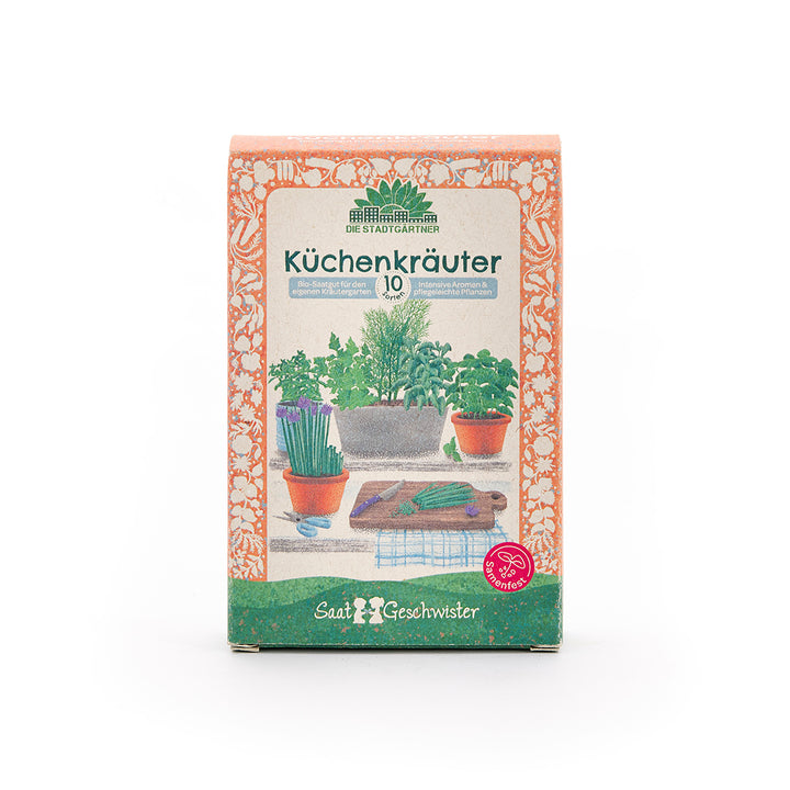 Verpackung für Küchenkräuter-Saatgut mit Illustrationen von Kräutertöpfen und einem Schneidebrett auf der Vorderseite.