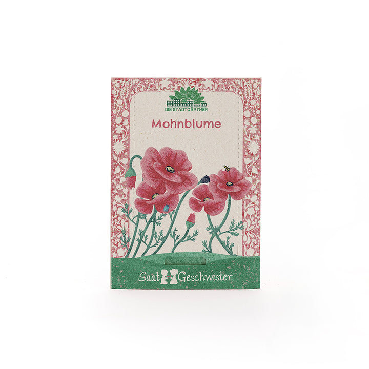 Saatgut-Tüte mit Illustration von roten Mohnblumen und der Aufschrift "Mohnblume" sowie "SaatGeschwister".